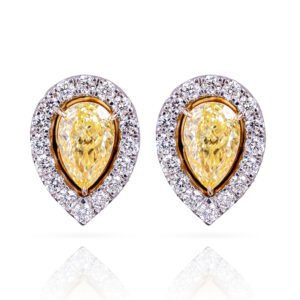 Enhance your style with the captivating allure of our Golden Glow Dewdrop Diamond Earrings. These earrings feature a stunning dewdrop shape adorned with sparkling diamonds and a radiant yellow stone. The combination of diamonds and the warm yellow stone creates a mesmerizing and vibrant effect. Let these earrings become a radiant and glamorous addition to your collection, adding a touch of glamour to any occasion.